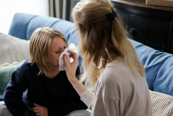 a mother taking care of her sick child - used in article on Salbutamol guide of usage